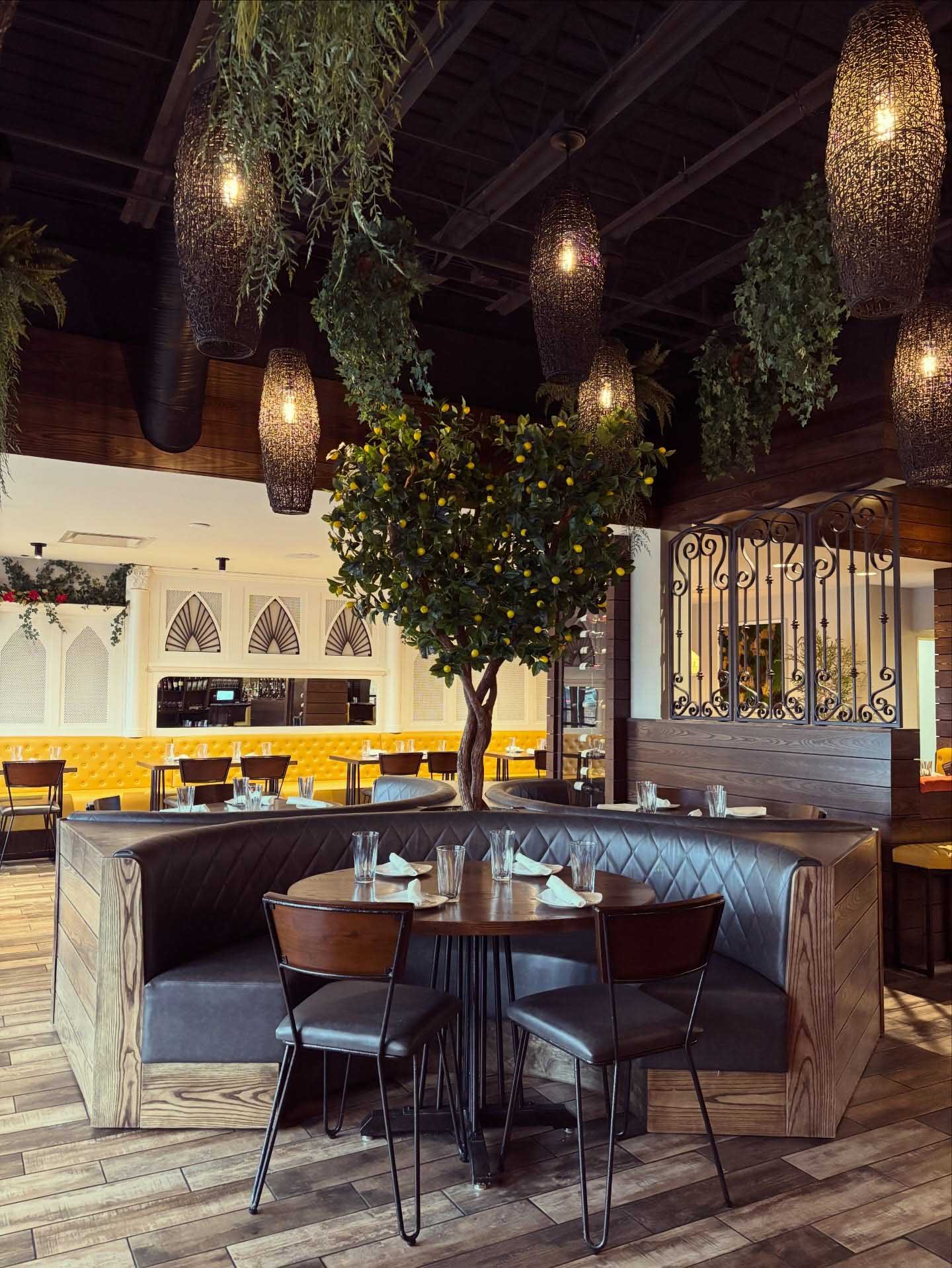 Taza Rocky River Custom Banquette Custom curved banquette and integrated table fabrication for Taza Rocky River restaurant